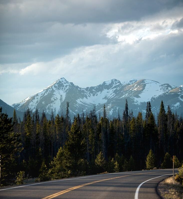 Scenic road through snowy mountains.