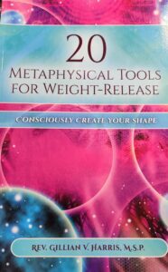 A book cover with the title of 2 0 metaphysical tools for weight-release.